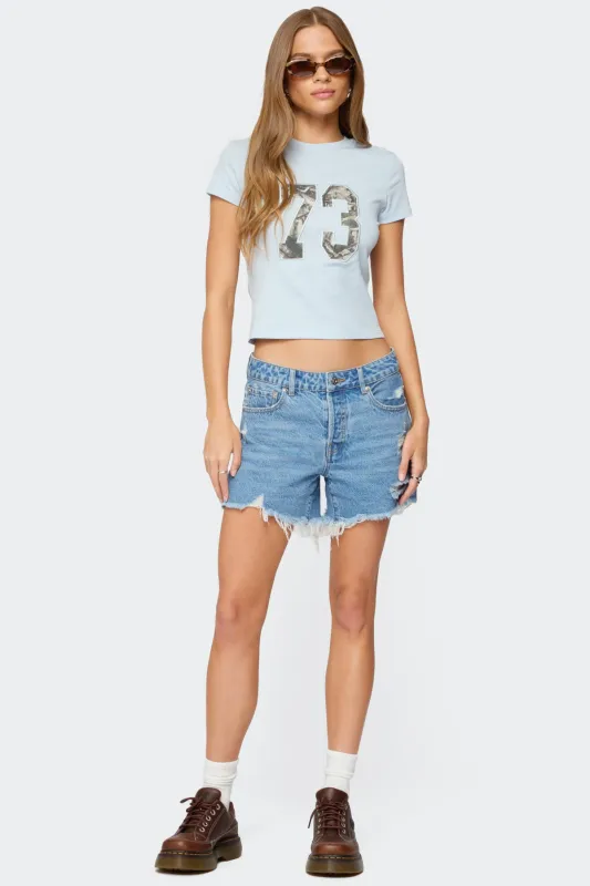 Cale Distressed Low Rise Denim Shorts sold by Edikted