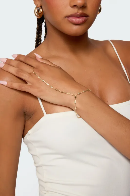 Star Hand Chain sold by Edikted