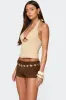 Evey Bead & Cut Out Halter Top sold by Edikted