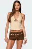 Evey Bead & Cut Out Halter Top sold by Edikted