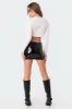 Electra Vinyl Mini Skirt sold by Edikted