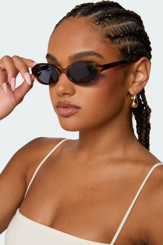 Clarke Oval Sunglasses sold by Edikted