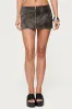 Jazz Zip Up Mini Skort sold by Edikted