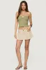 Klay Linen Look Pleated Mini Skort sold by Edikted