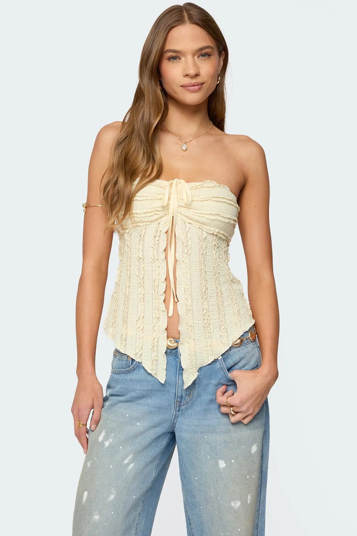 Textured Ruffle Split Front Strapless Top sold by Edikted