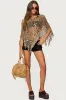 Fringe Sequin Crochet Poncho sold by Edikted