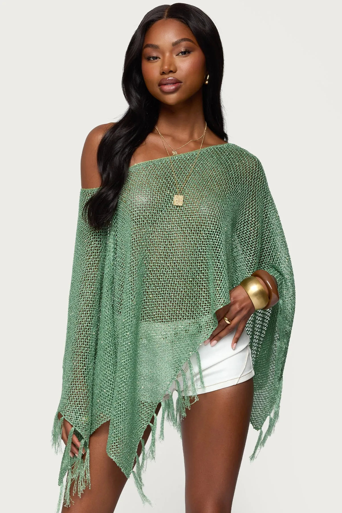 Sequin Fringe Knit Poncho sold by Edikted