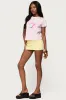 Ocean’s Calling Coastal T Shirt sold by Edikted