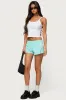 Nikki Nylon Shorts sold by Edikted