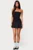 Evonna Strapless Flared Romper sold by Edikted