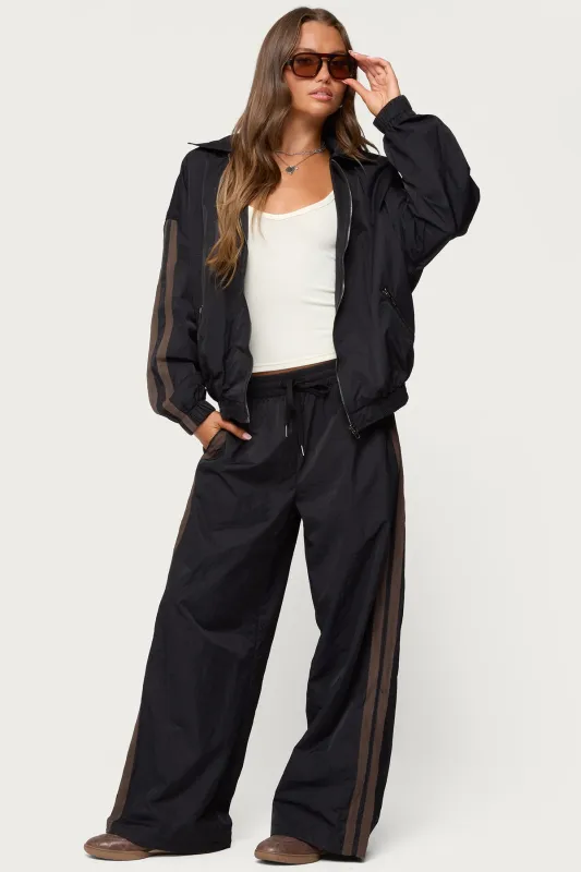 Kieran Stripey Nylon Track Pants sold by Edikted