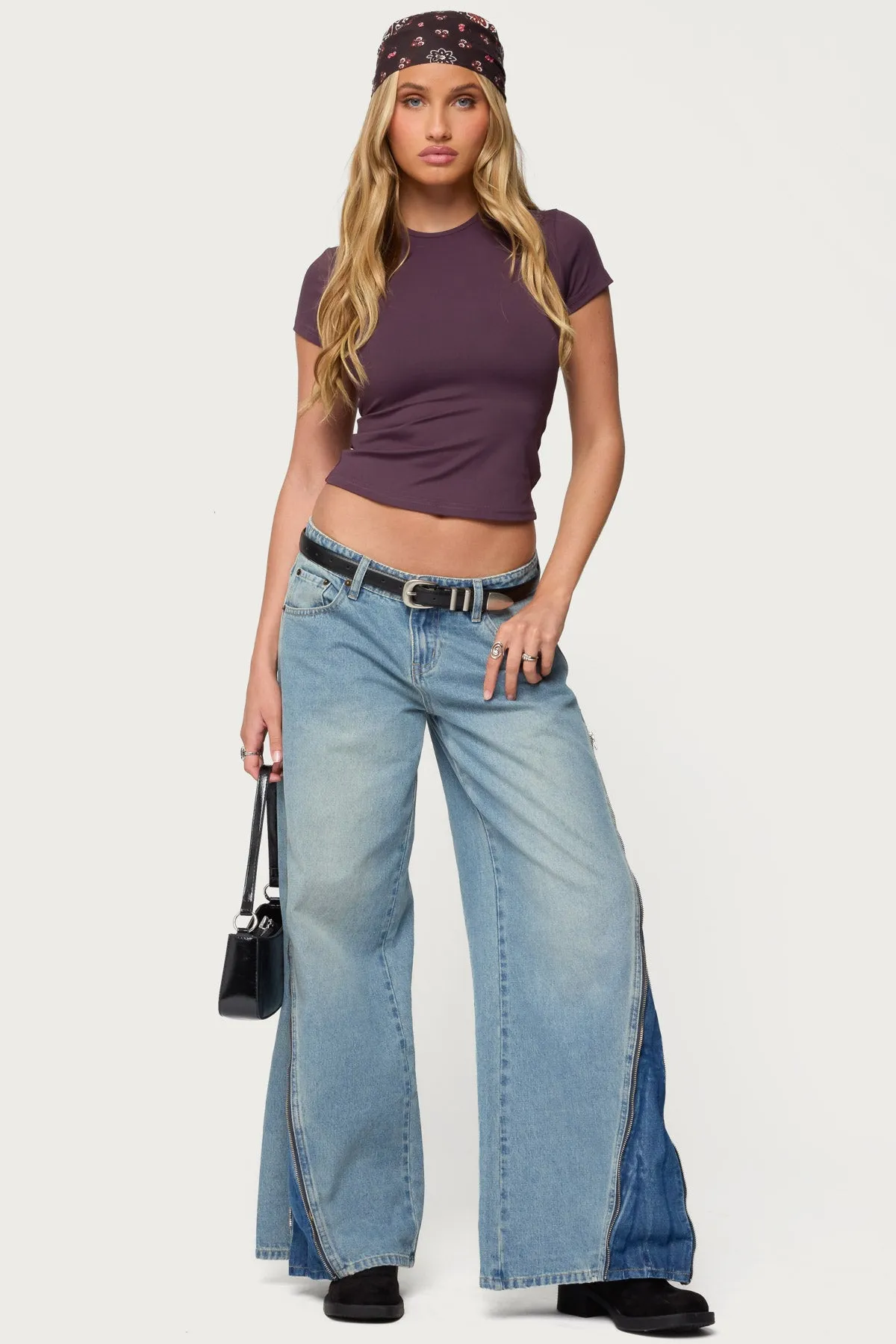 Zippered Washed Low Rise Wide Leg Jeans sold by Edikted
