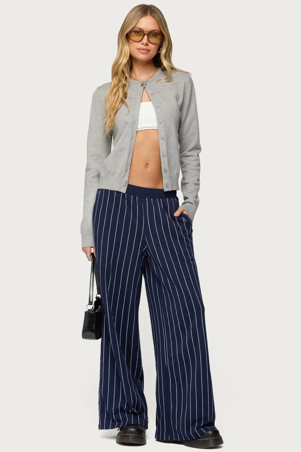 Mercer Pinstripe Wide Leg Sweatpants sold by Edikted