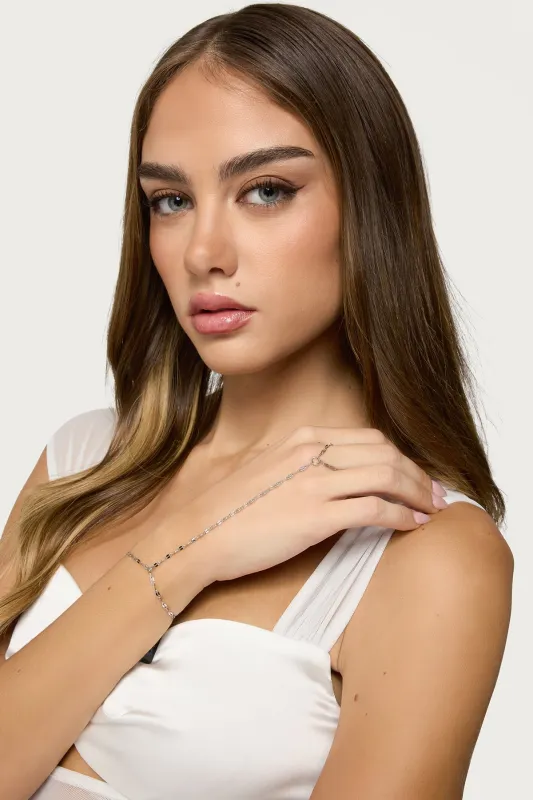 Dazzle Hand Chain sold by Edikted