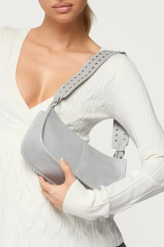 Studded Strap Faux Leather Bag sold by Edikted