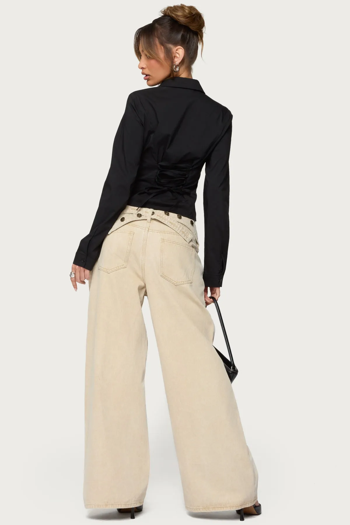 Buttoned Belt Low Rise Baggy Jeans sold by Edikted