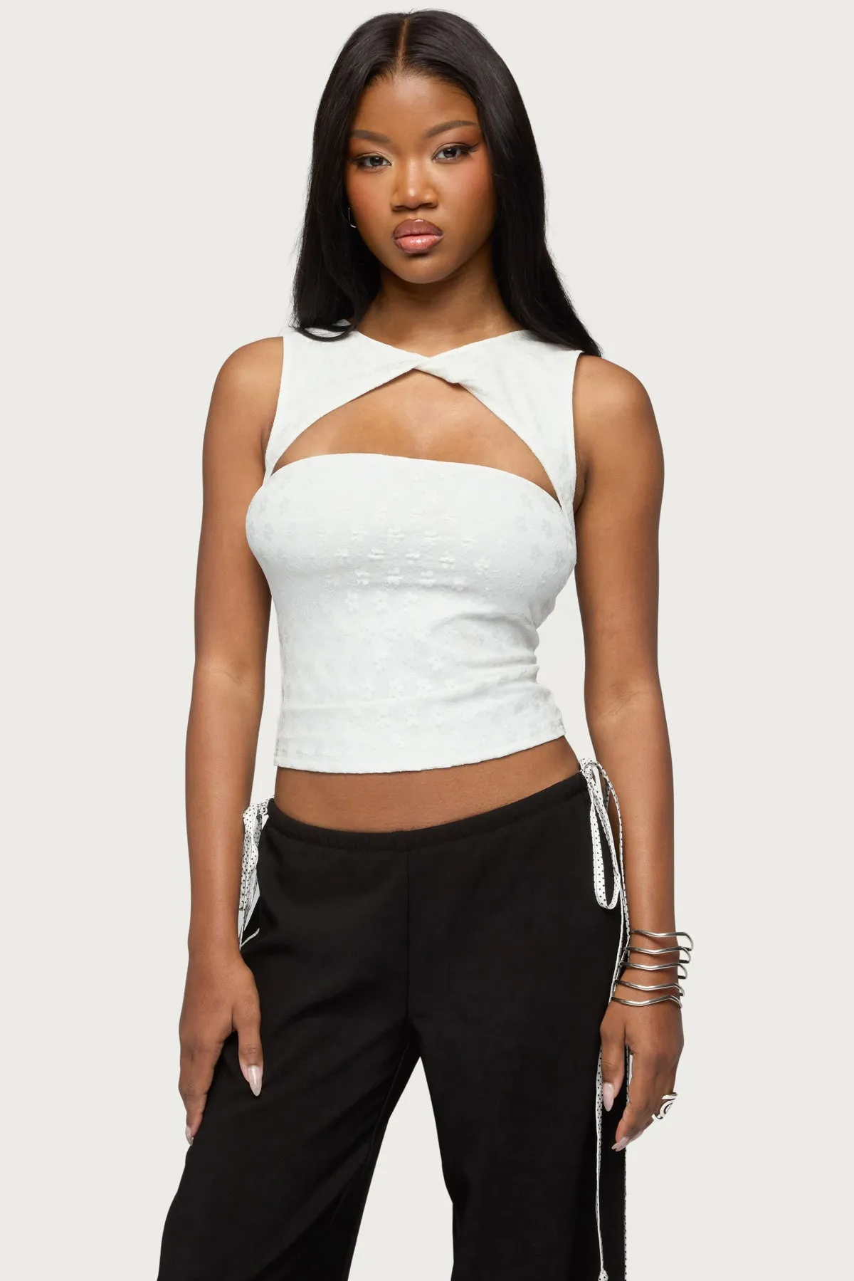 Elisia Twist Cutout Flower Lace Top sold by Edikted