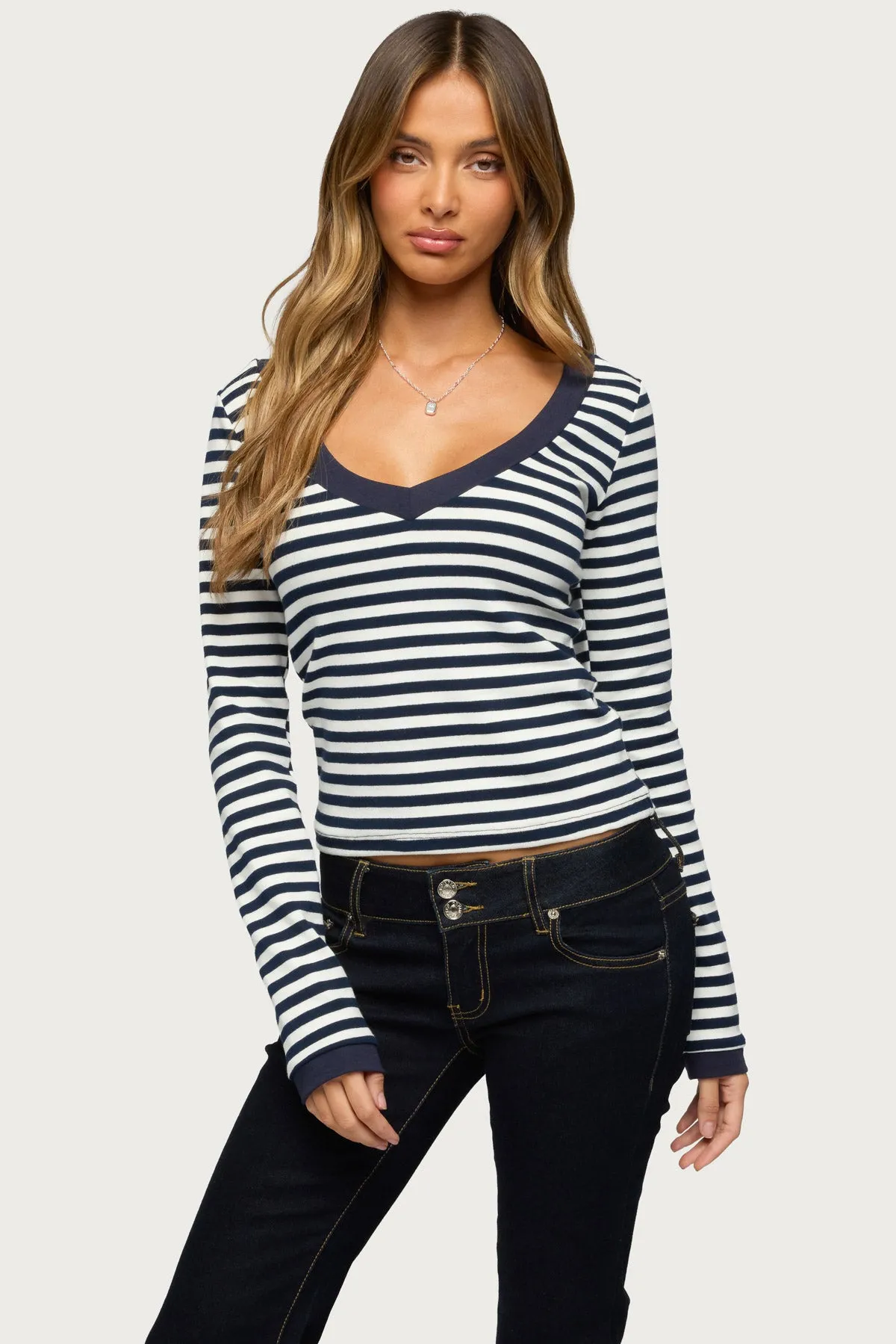 Kimi Striped Long Sleeve V Neck Top sold by Edikted