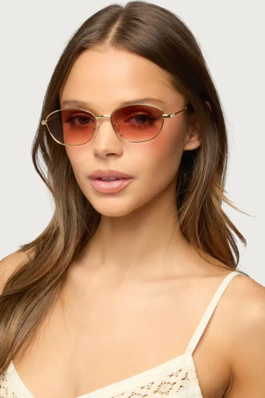 Rozie Oval Sunglasses made by Edikted