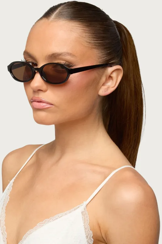 Clarke Oval Sunglasses made by Edikted