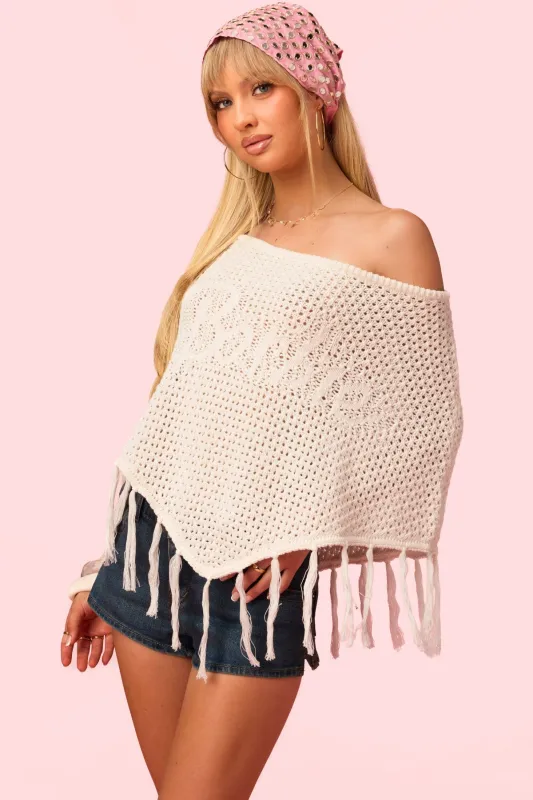 Barbie™ Fringe Knit Poncho made by Edikted