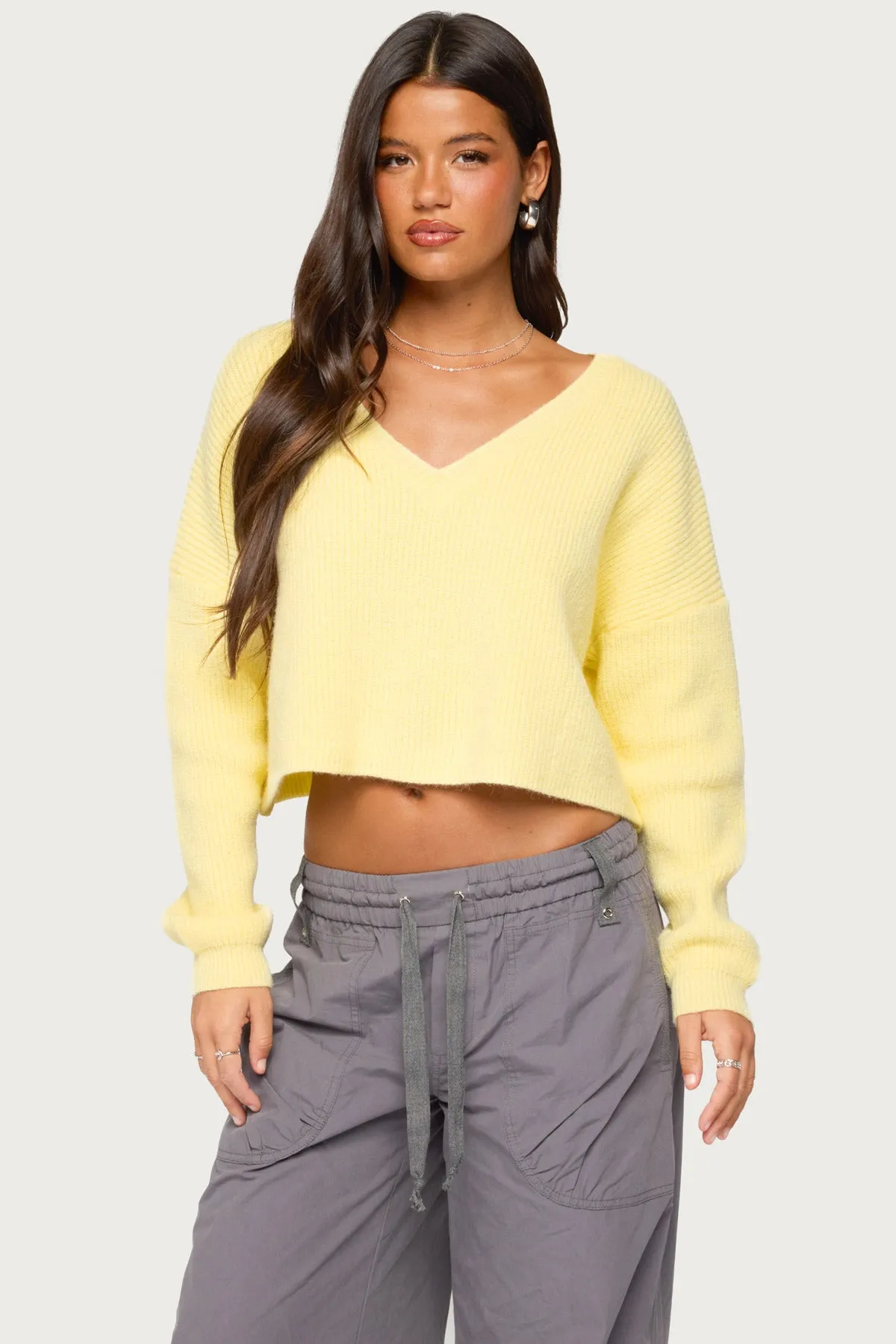 Aima V Neck Ribbed Knit Sweater sold by Edikted