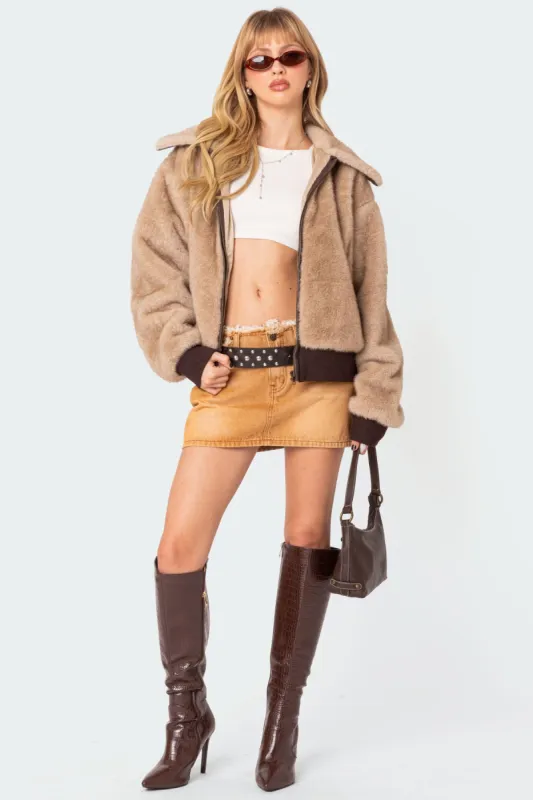 Ariah Distressed Hem Washed Denim Mini Skirt sold by Edikted