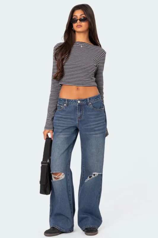 Debbie Distressed Low Rise Jeans sold by Edikted