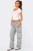 Via Low Rise Washed Denim Cargo Pants sold by Edikted