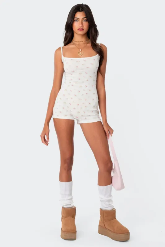 Ditsy Open Back Tie Romper sold by Edikted