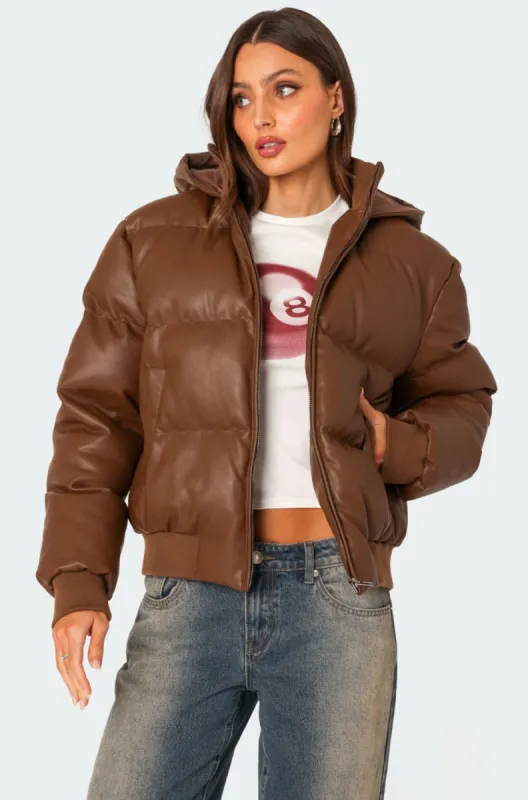 Wintry Faux Leather Hooded Puffer sold by Edikted