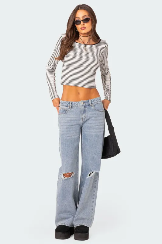 Debbie Distressed Low Rise Jeans sold by Edikted