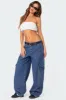 Super Oversized Belted Boyfriend Jeans sold by Edikted