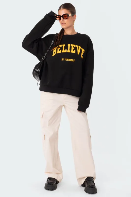 Believe Sweatshirt sold by Edikted