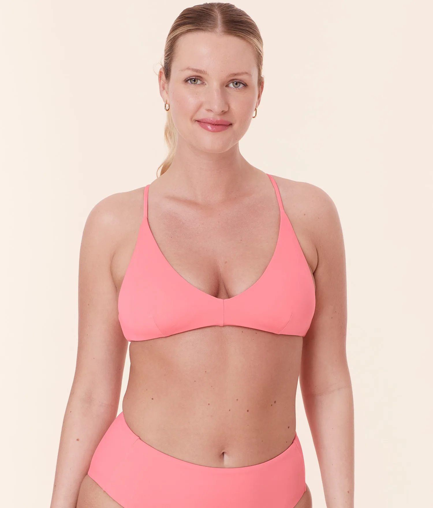 The Elwood Bikini Top - Eco Nylon - Petal sold by Andie