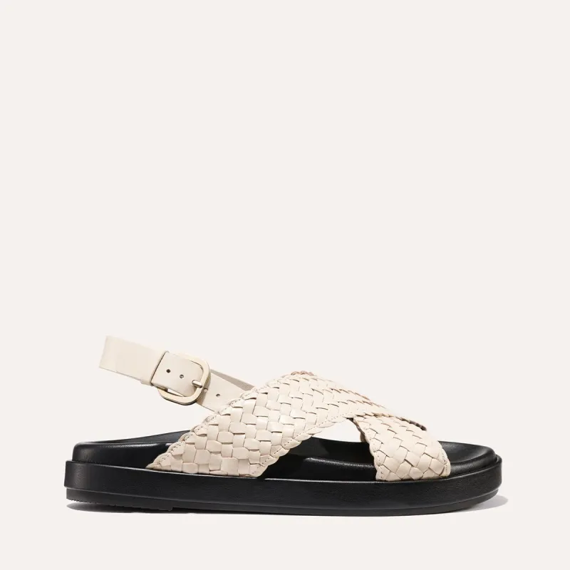 The Petra Sandal - Ecru Woven Leather sold by Margaux