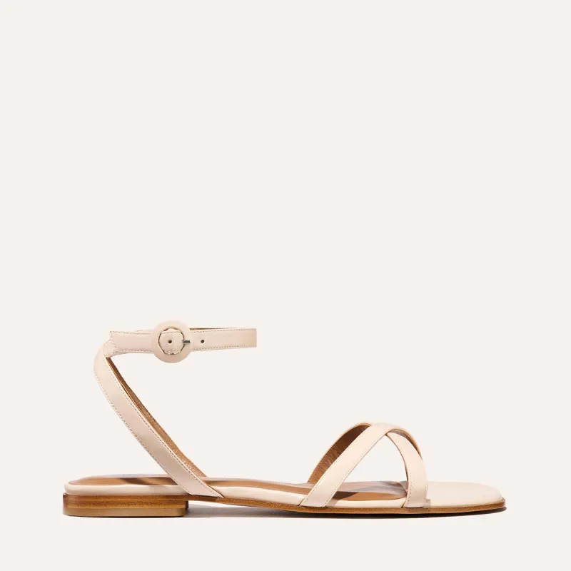 The Flat Sandal - Magnolia Nappa sold by Margaux
