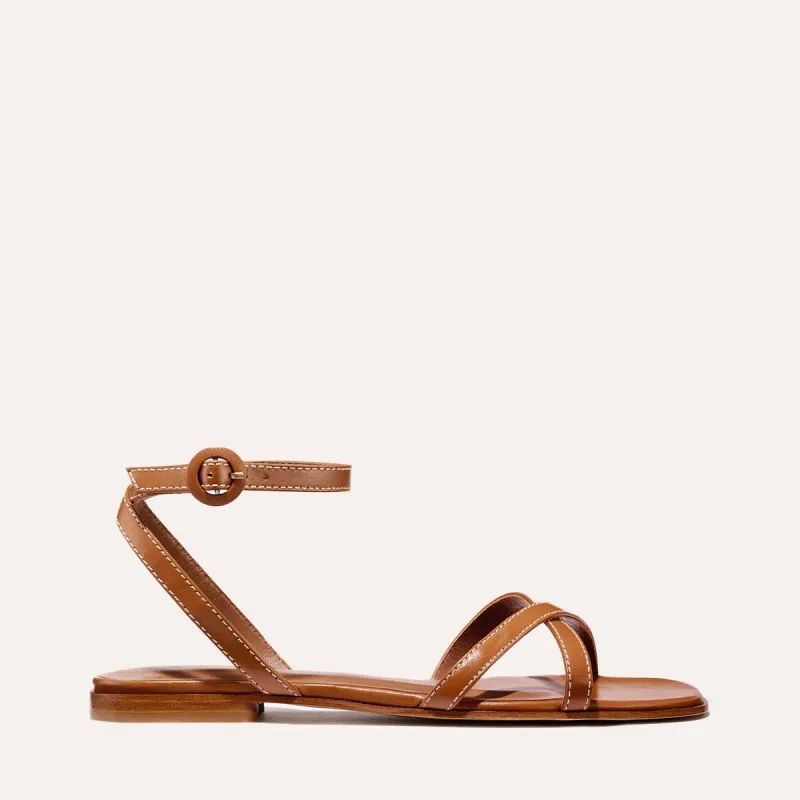 The Flat Sandal - Saddle Nappa sold by Margaux