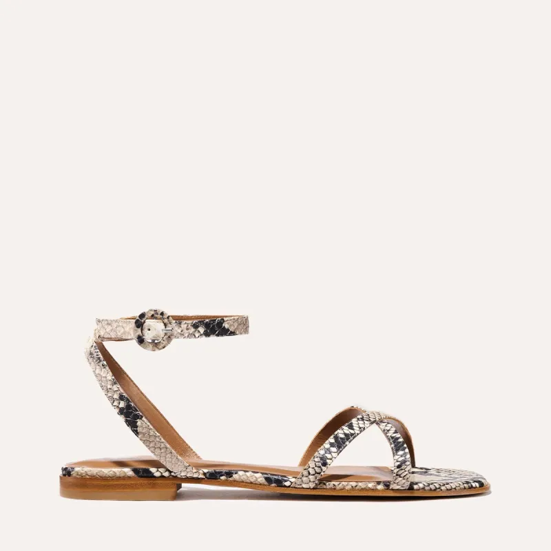 The Flat Sandal - Natural Python Embossed sold by Margaux