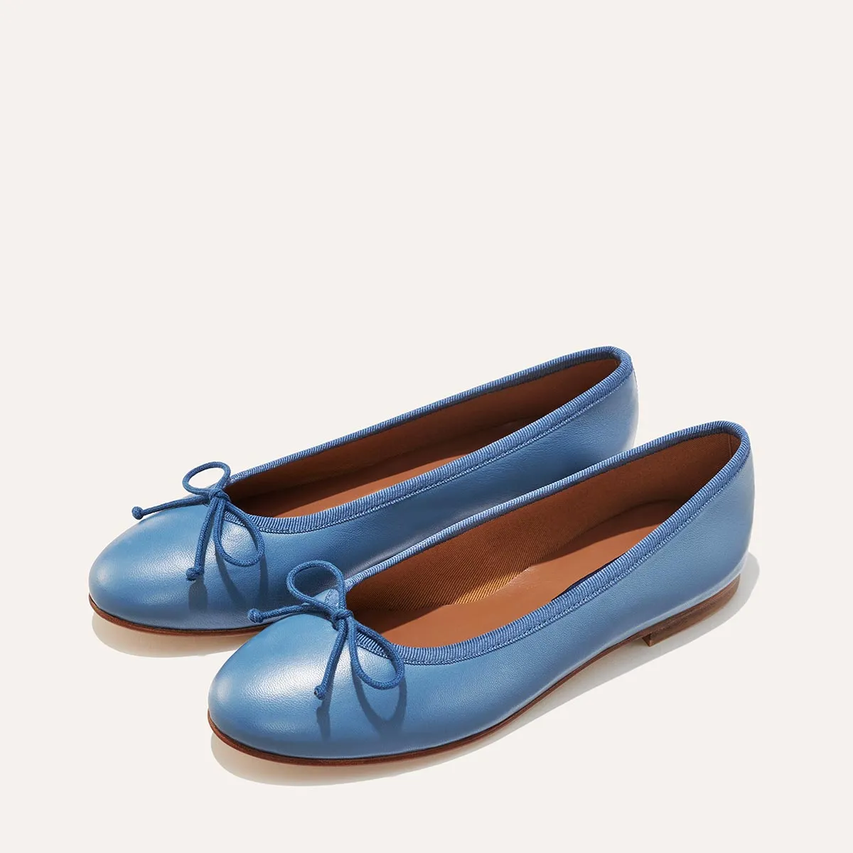 The Demi - Cerulean Nappa sold by Margaux