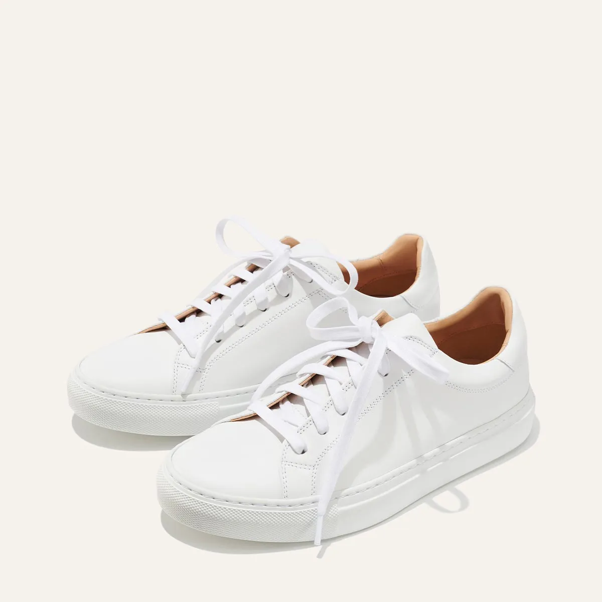 The Sneaker - White Calf sold by Margaux