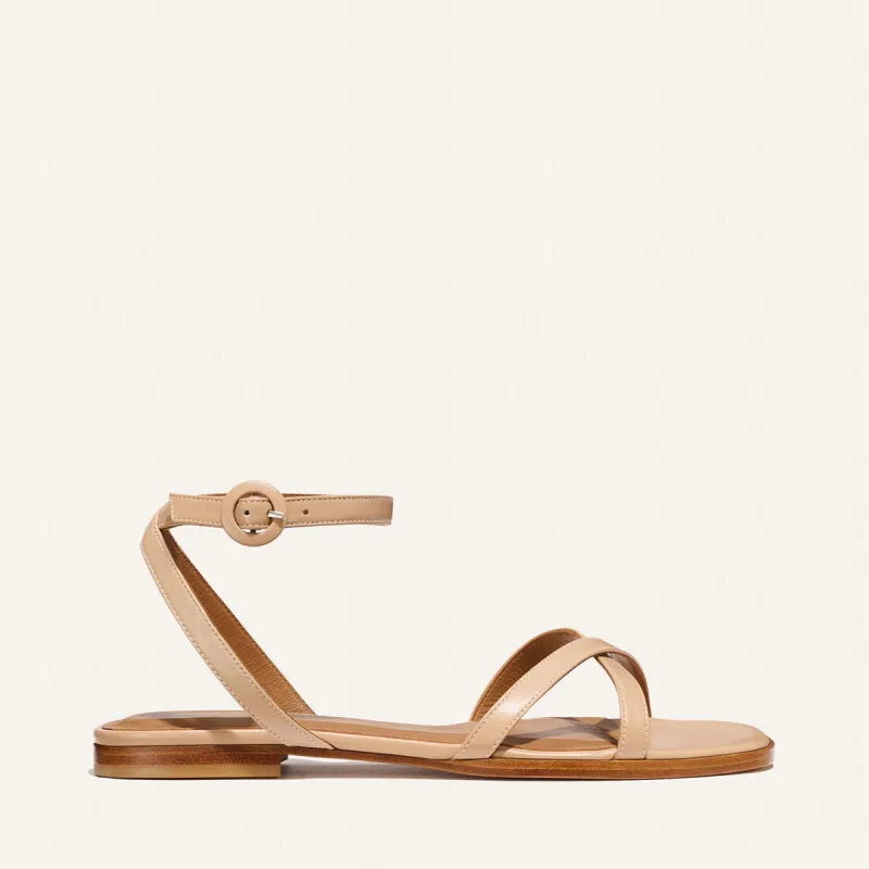 The Flat Sandal - Dune Nappa sold by Margaux