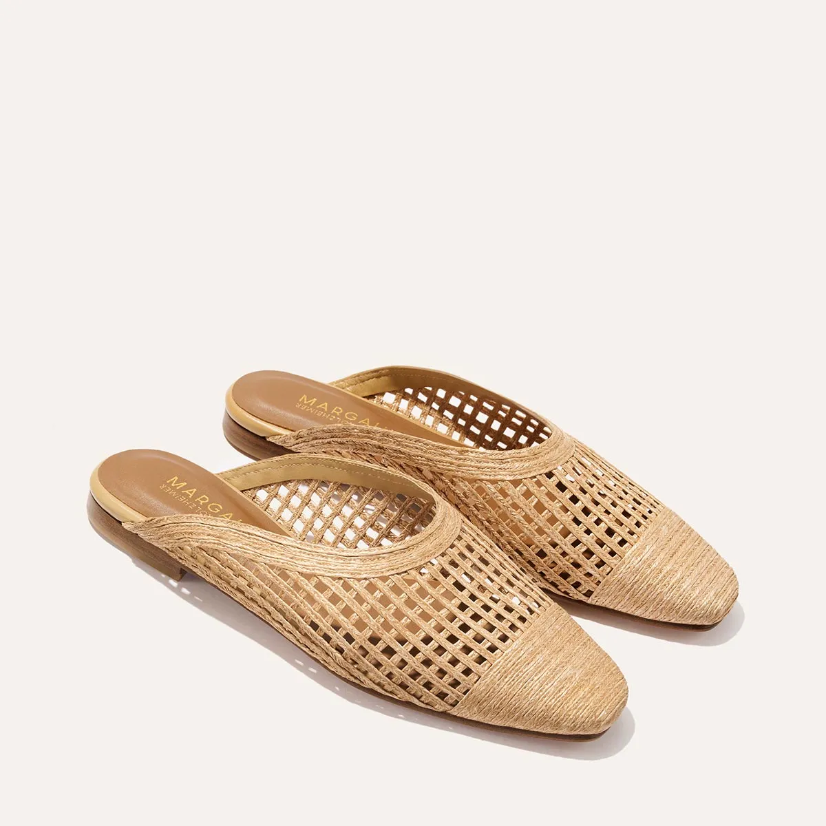 The Clara - Natural Grid Raffia sold by Margaux