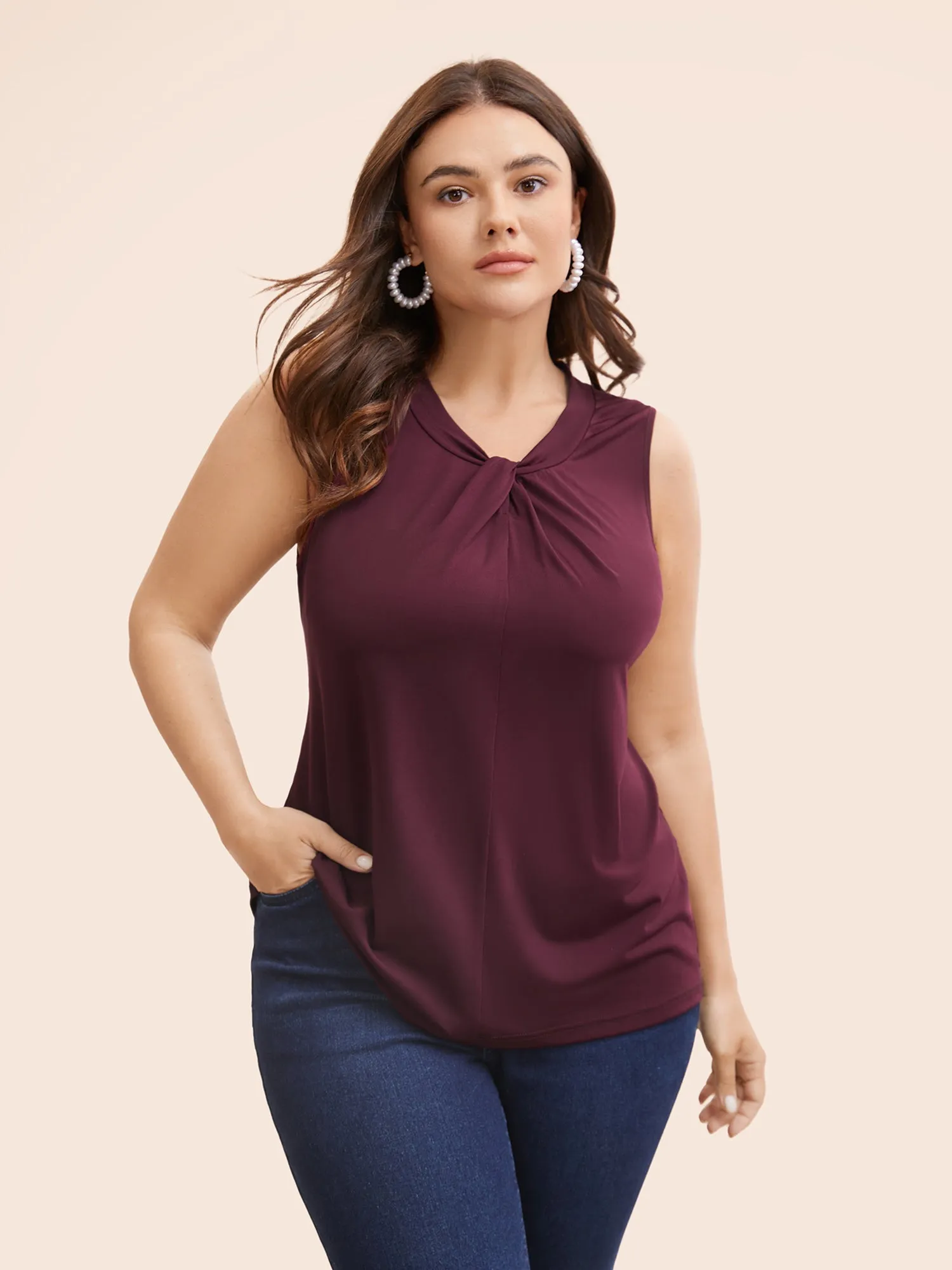 Solid Asymmetrical Neck Twist Front Tank Top sold by Bloomchic