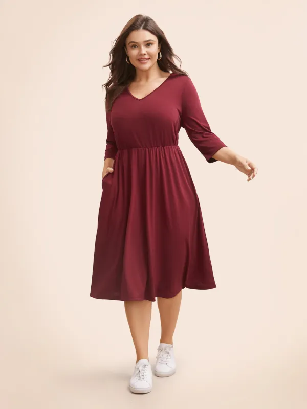 Solid V Neck Elastic Waist Midi Dress sold by Bloomchic