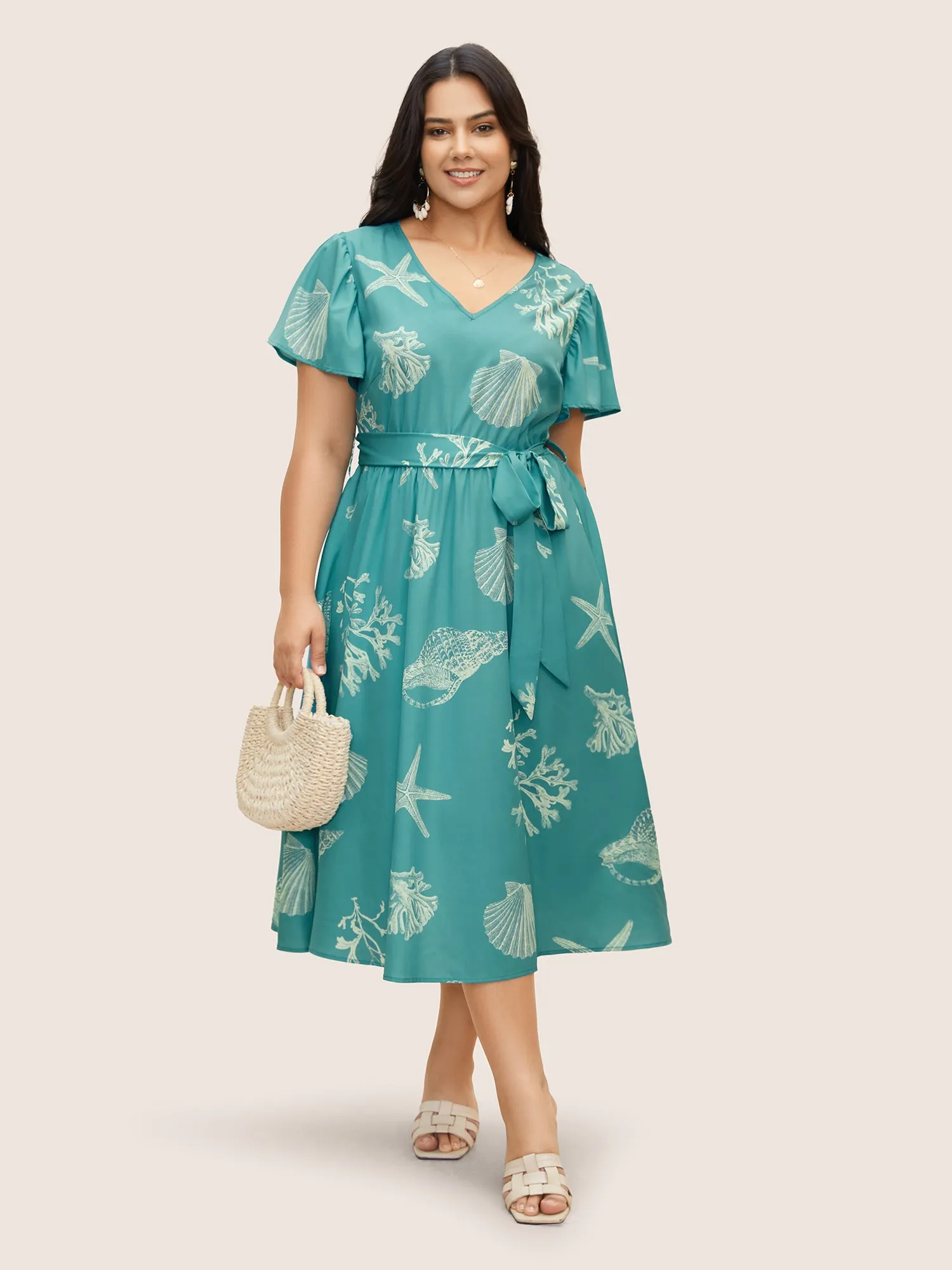 Marine Elements Ruffle Sleeve Belted Dress sold by Bloomchic