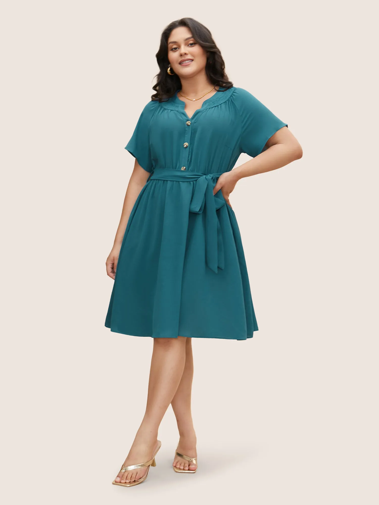 Shirred Notched Button Up Belted Dress sold by Bloomchic