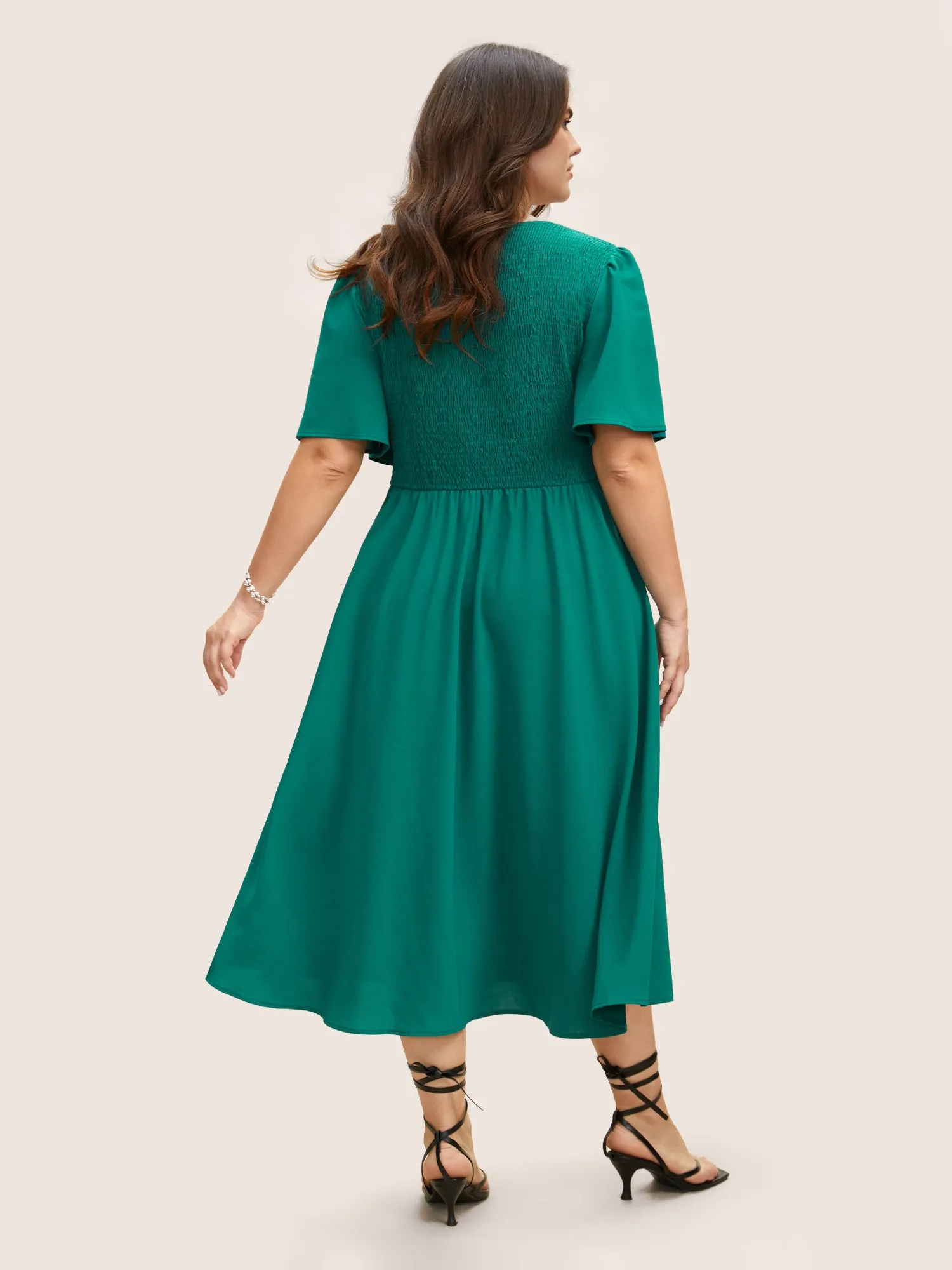 Solid Shirred Crossover Flutter Sleeve Dress sold by Bloomchic product image thumbnail 3