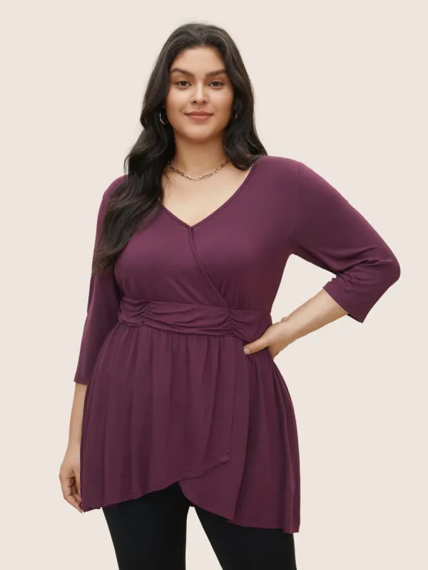 Solid Wrap Ruched Asymmetrical Hem T-shirt sold by Bloomchic