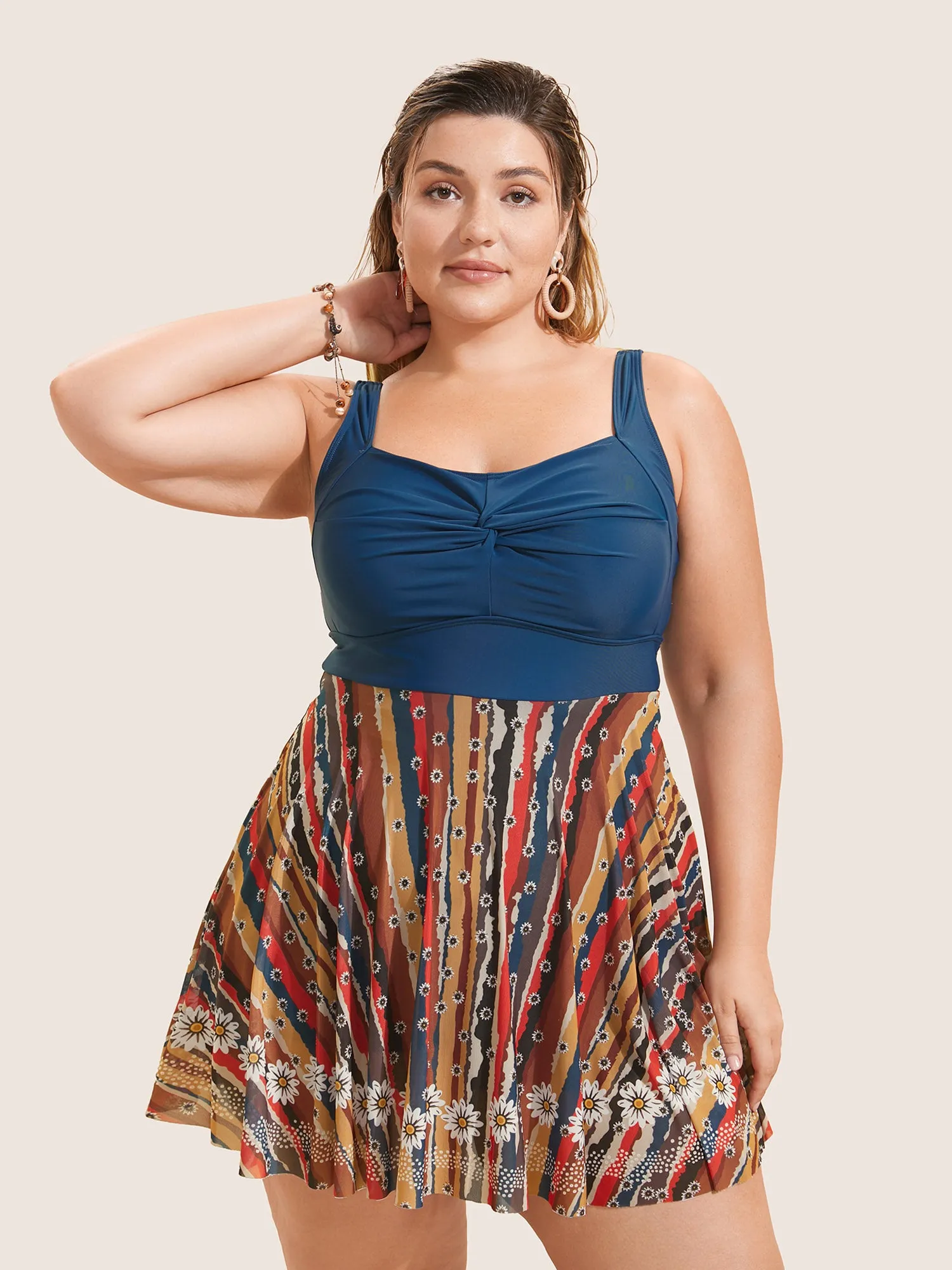 Colored Striped Twist Front Patchwork Swim Dress sold by Bloomchic